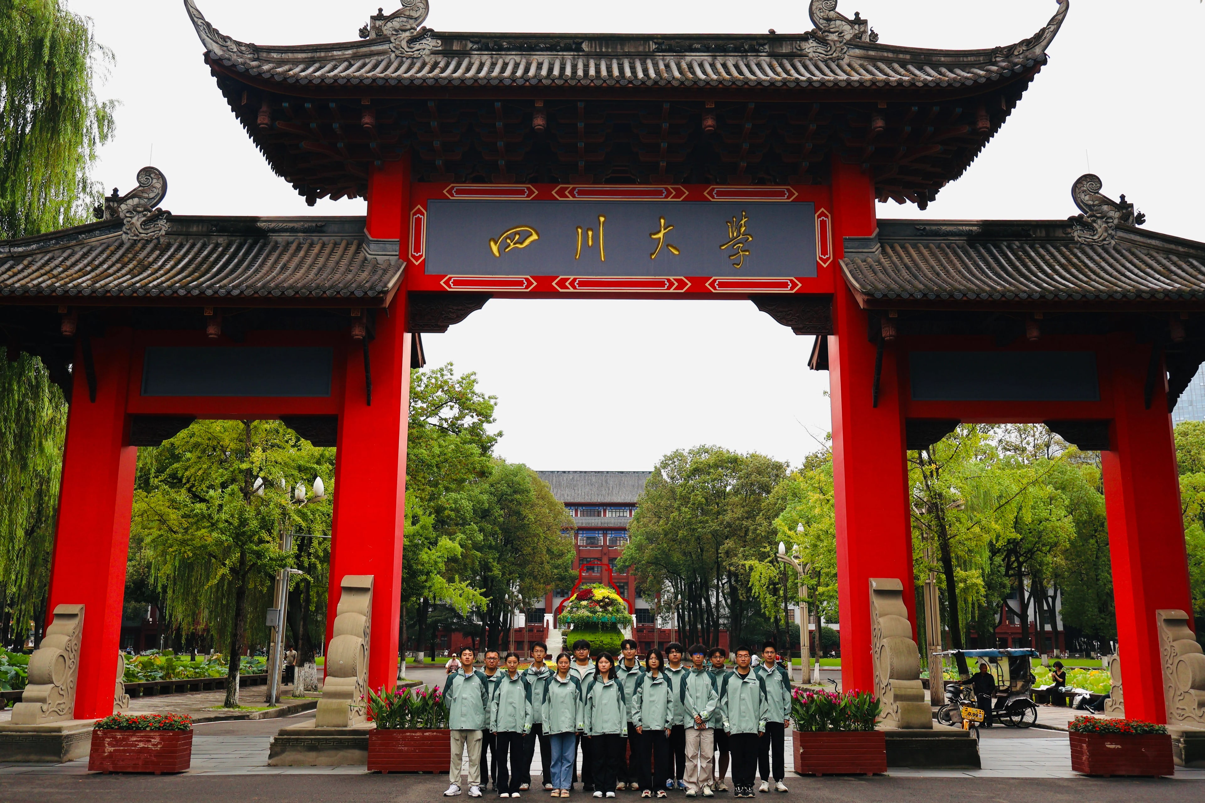 Students at the Sichuan University campus entrance in Chengdu